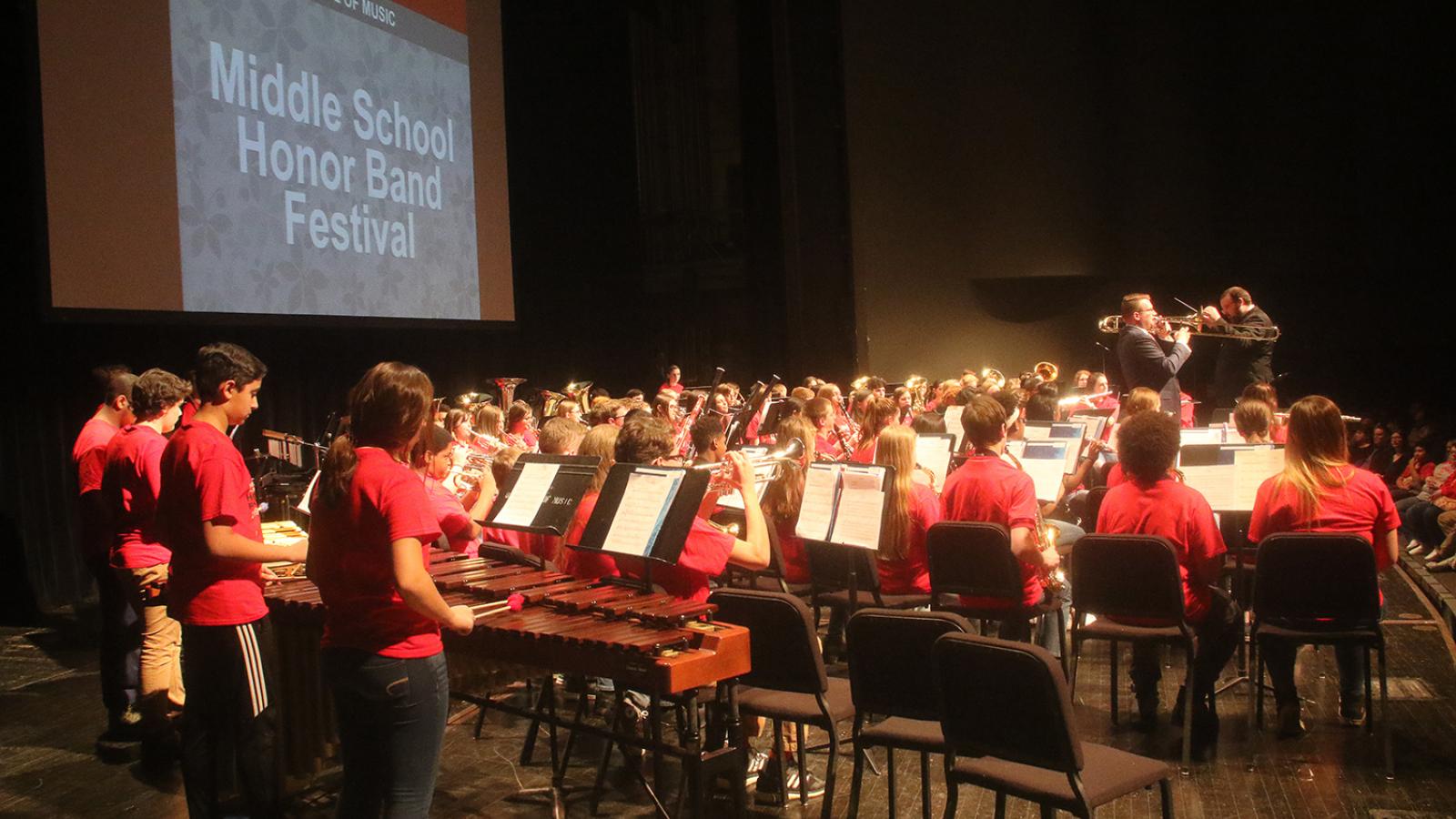 Middle School Honor Band 2019 rehearsal on Mershon stage